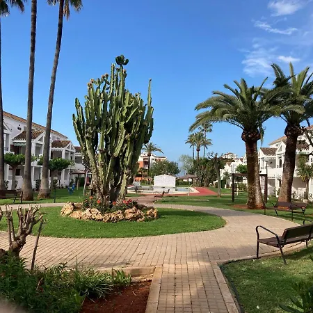 Сasa de vacaciones Adosado En Urbanización Con Precioso Jardín